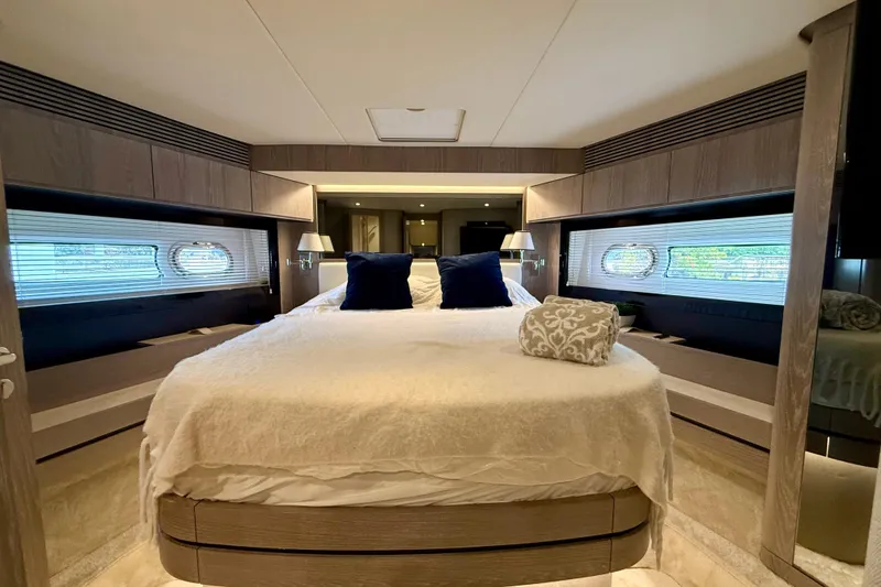 Slide: The Image of Luxurious bedroom interior of 2020 Azimut Magellano 66 yacht with elegant decor. - 65