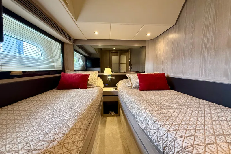 Slide: The Image of Luxurious twin cabin interior of 2020 Azimut Magellano 66 yacht with elegant bedding. - 75