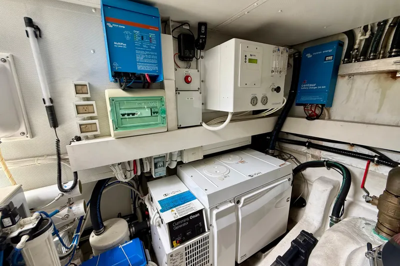 Slide: The Image of Engine room of 2020 Azimut Magellano 66 yacht with electrical equipment and generator. - 88