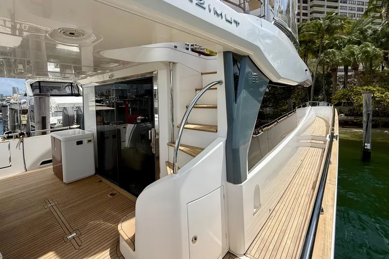 Slide: The Image of Azimut Magellano 66 yacht, 2020 model, featuring elegant deck and modern design elements. - 9