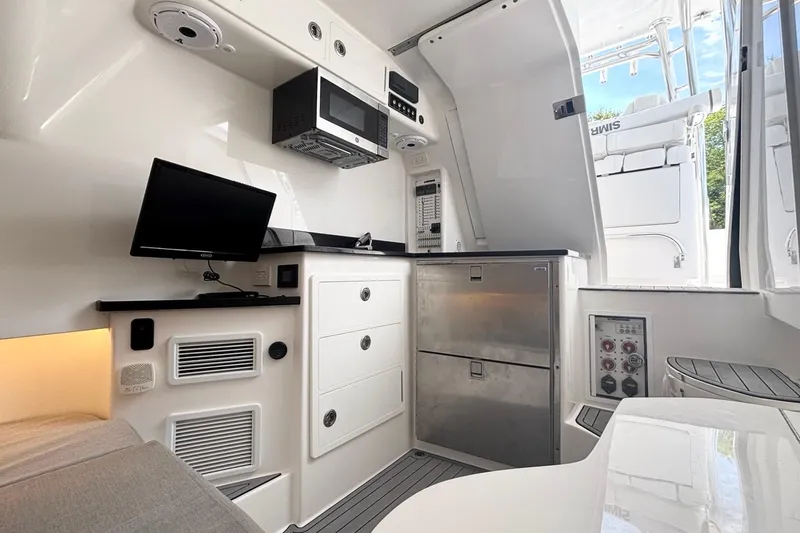 Slide: The Image of Interior of 2021 Contender 39 Fisharound boat with modern amenities and sleek design. - 19