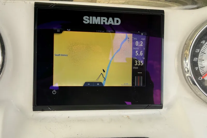 Slide: The Image of Simrad navigation display on 2020 Hurricane SunDeck Sport 185 OB, showing South Venice map. - 13