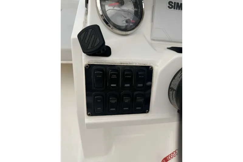 Slide: The Image of Dashboard controls of a 2020 Hurricane SunDeck Sport 185 OB boat. - 15