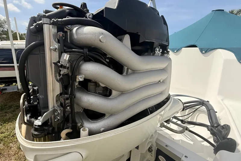 Slide: The Image of Outboard engine of 2020 Hurricane SunDeck Sport 185 OB boat, detailed view. - 23