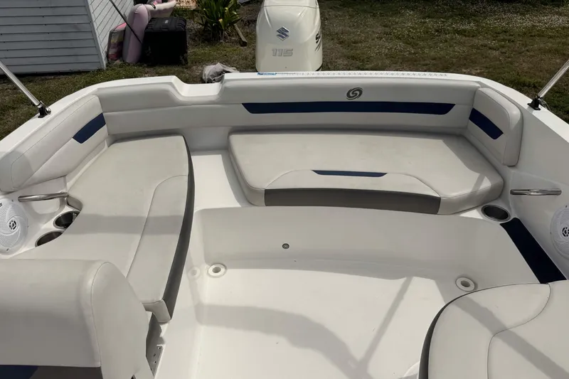 Slide: The Image of 2020 Hurricane SunDeck Sport 185 OB boat interior with cushioned seating and cup holders. - 8