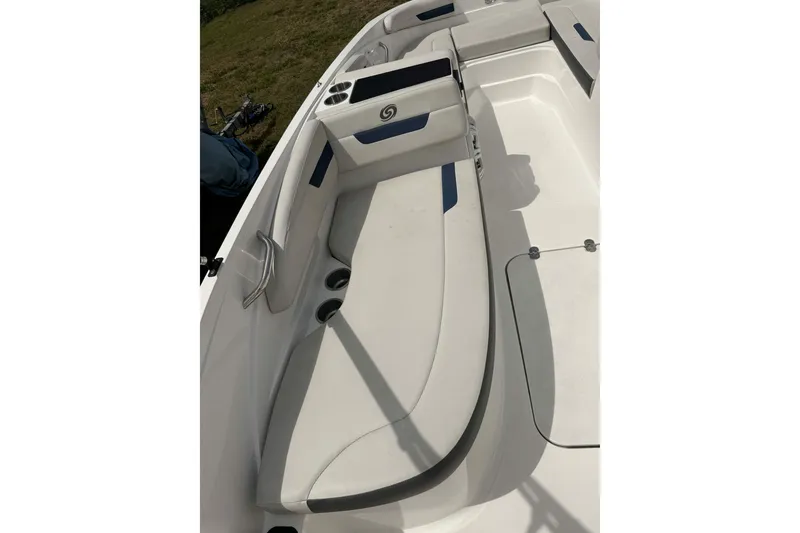 Slide: The Image of 2020 Hurricane SunDeck Sport 185 OB boat interior with seating and cup holders. - 9