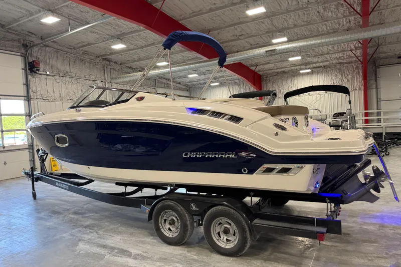 Slide: The Image of 2015 Chaparral 257 SSX boat on trailer in indoor showroom. - 4