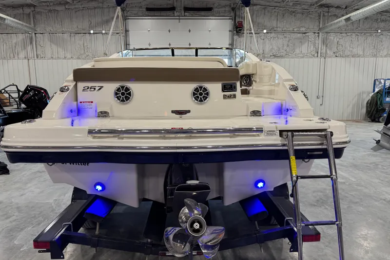 Slide: The Image of 2015 Chaparral 257 SSX boat on trailer in indoor storage facility. - 5