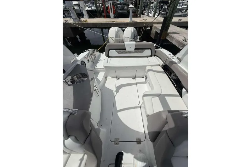 Slide: The Image of 2022 Four Winns H290 OB boat interior with spacious seating and modern design. - 17