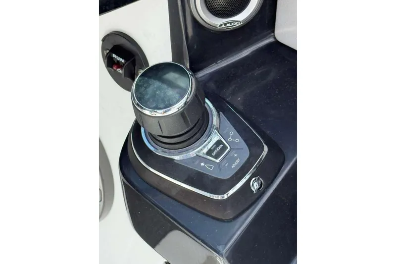 Slide: The Image of 2022 Four Winns H290 OB boat control panel with joystick and JL Audio speaker. - 7