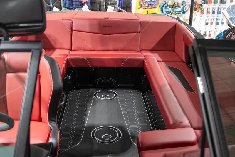 Slide: The Image of 2024 MasterCraft NXT23 interior with red leather seating. - 5