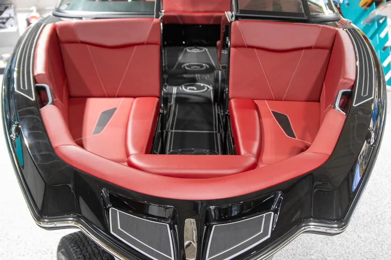 Slide: The Image of 2024 MasterCraft NXT23 interior with red leather seating. - 8