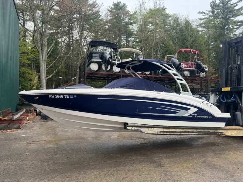 Slide: The Image of 2023 Chaparral 23 SSi boat in storage yard. - 3