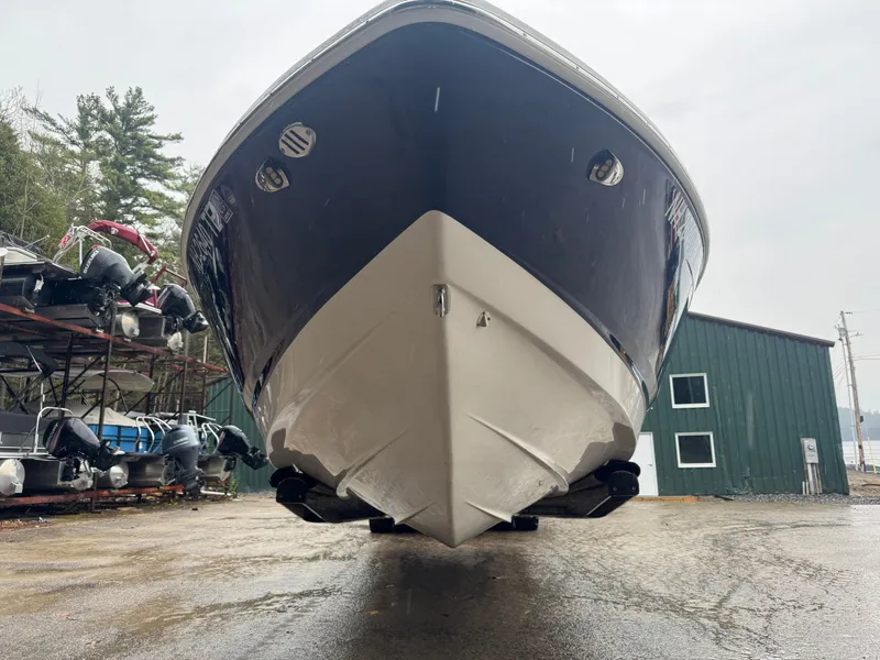Slide: The Image of 2023 Chaparral 23 SSi boat on a dry dock. - 6