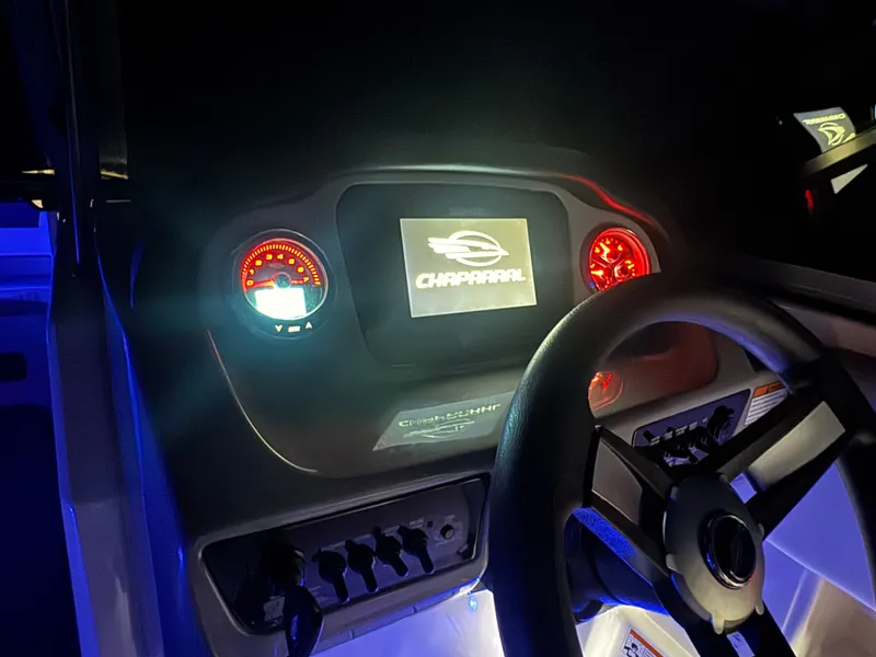 Slide: The Image of Dashboard of 2023 Chaparral 23 SSi with illuminated display. - 7