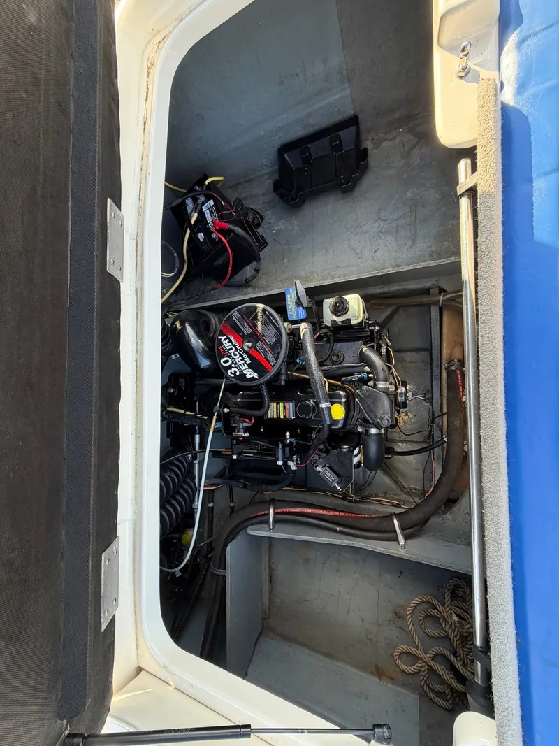 Slide: The Image of Engine compartment of a 2006 Bayliner 185 Sport boat. - 10
