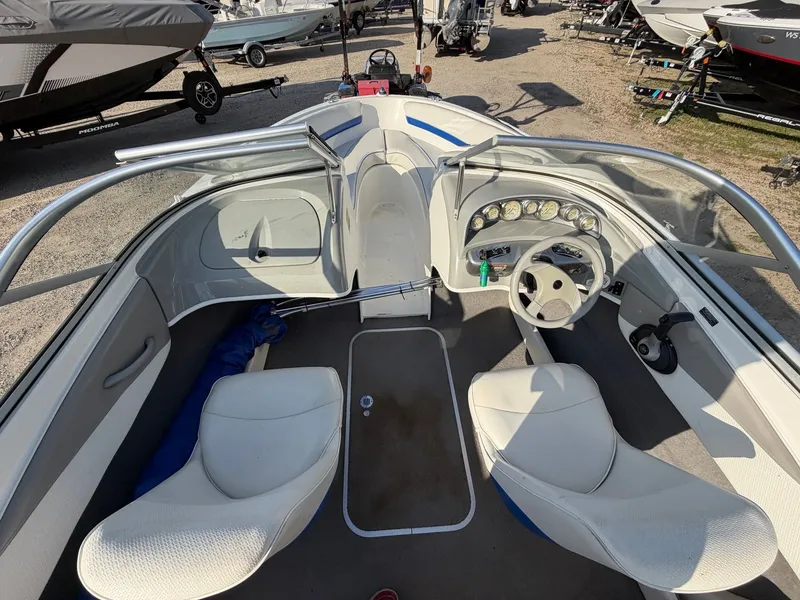 Slide: The Image of Interior of a 2006 Bayliner 185 Sport boat with steering console. - 4