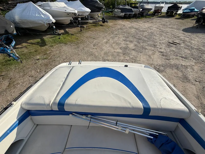 Slide: The Image of 2006 Bayliner 185 Sport boat in a parking area. - 9