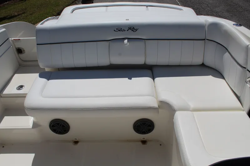 Slide: The Image of 2014 Sea Ray SLX 230 boat with white seating area. - 13