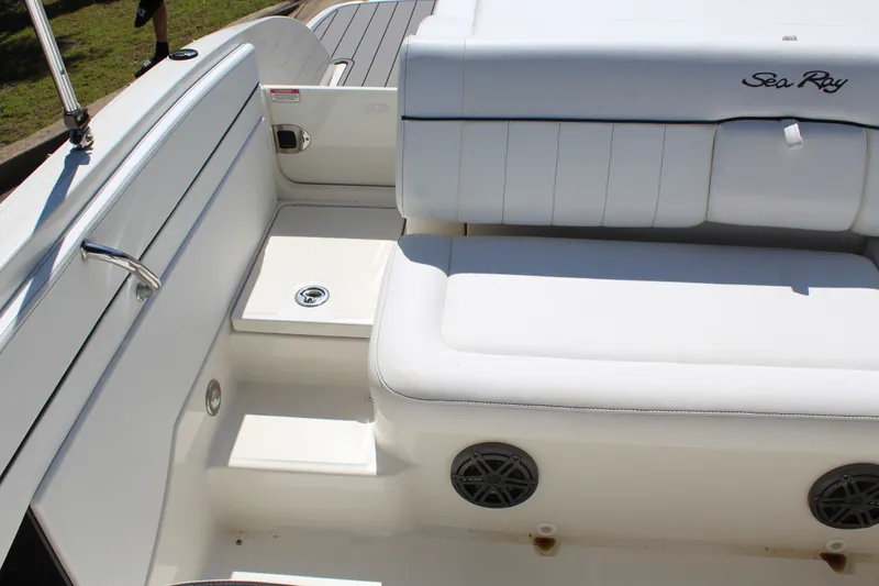 Slide: The Image of Interior of a 2014 Sea Ray SLX 230 boat with white seating. - 14