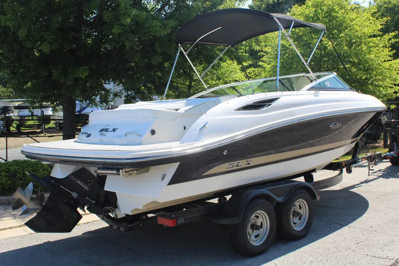 Slide: The Image of 2014 Sea Ray SLX 230 boat on trailer, side view. - 7