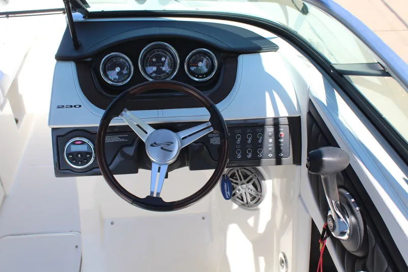 Slide: The Image of Dashboard of a 2014 Sea Ray SLX 230 boat. - 9