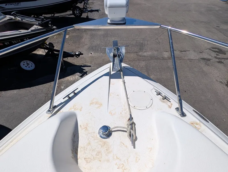 Slide: The Image of Bow of a 2007 Larson Cabrio 240 with anchor. - 10