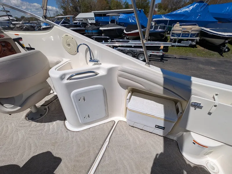 Slide: The Image of Interior of a 2007 Larson Cabrio 240 with sink and cooler. - 17