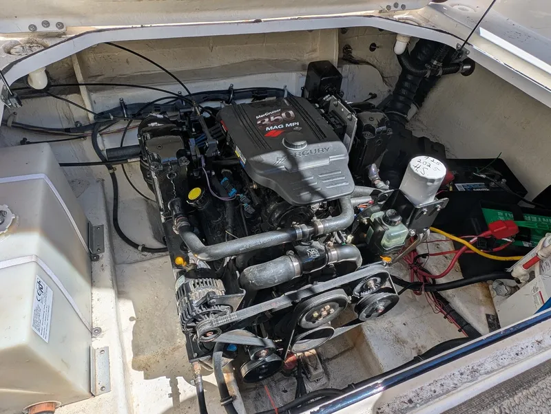 Slide: The Image of Engine compartment of a 2007 Larson Cabrio 240 boat with MerCruiser engine. - 20