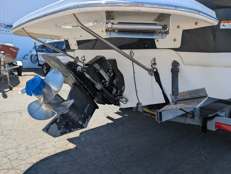 Slide: The Image of Rear view of a 2007 Larson Cabrio 240 boat with propeller. - 6