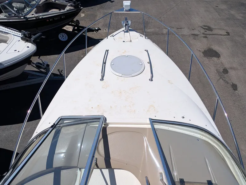 Slide: The Image of 2007 Larson Cabrio 240 boat, front deck view. - 9