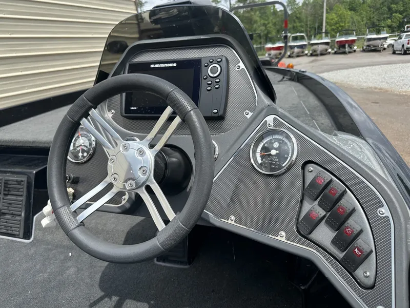 Slide: The Image of 2013 Ranger Z100 Series boat dashboard with Humminbird display. - 9