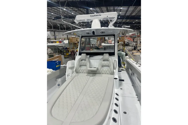 Slide: The Image of 2025 Freeman 35 boat interior with Garmin equipment in a manufacturing facility. - 9