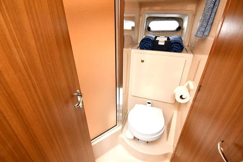 Slide: The Image of Bathroom interior of 2001 Bayliner 3788 Command Bridge Motoryacht with shower and toilet. - 14