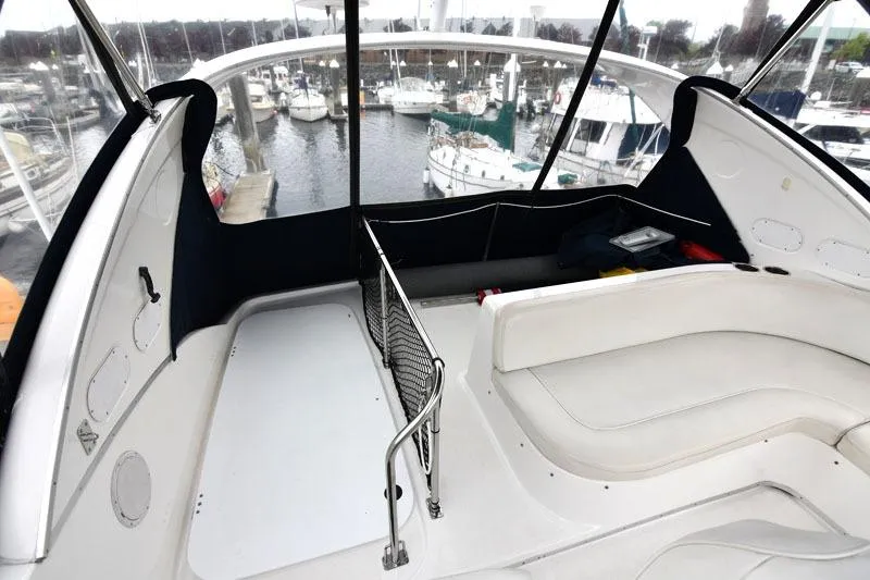 Slide: The Image of 2001 Bayliner 3788 Command Bridge Motoryacht interior with marina view. - 15