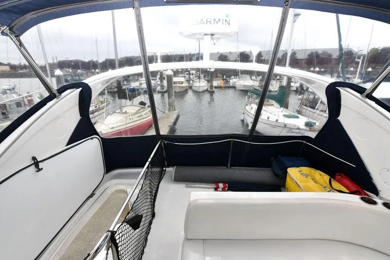Slide: The Image of 2001 Bayliner 3788 Command Bridge Motoryacht interior with marina view. - 19