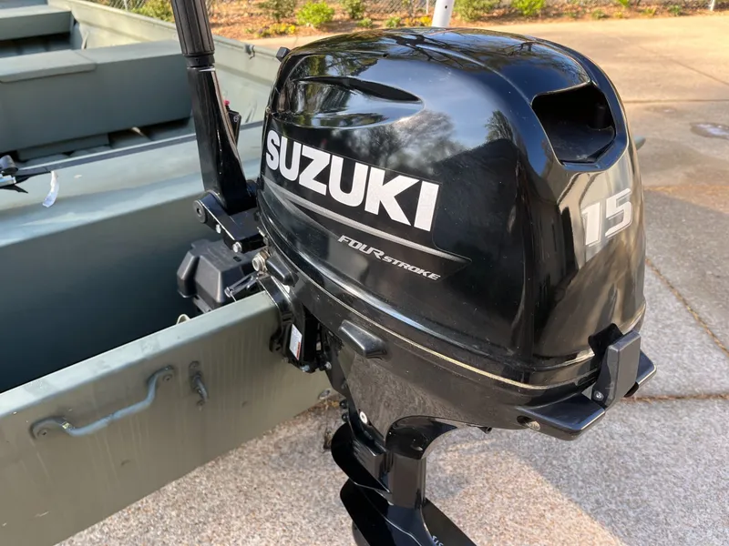 Slide: The Image of Suzuki 15 HP outboard motor on Polar Kraft DKJ1648-15 boat. - 5
