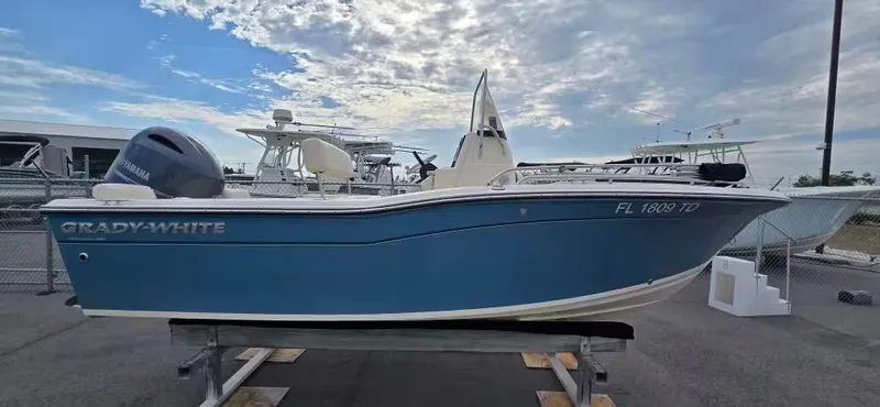The Image of 2021 Grady-White Fisherman 180 boat on a trailer outdoors. - 1