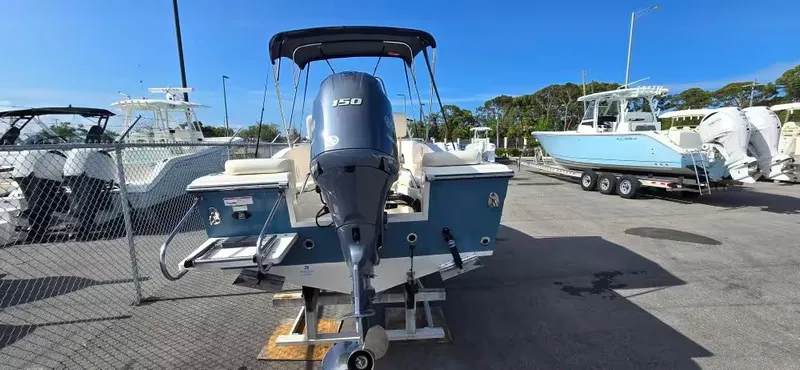 Slide: The Image of 2021 Grady-White Fisherman 180 boat with outboard motor in parking lot. - 5