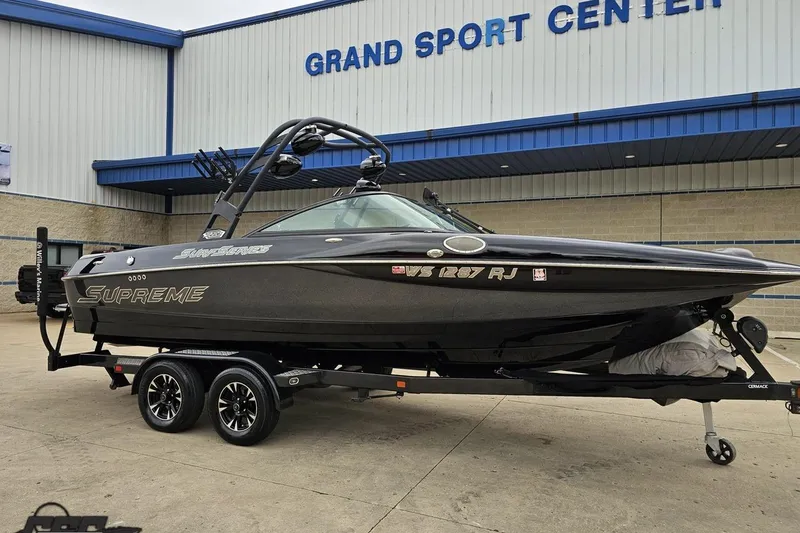 Slide: The Image of 2018 Supreme S226 boat on trailer at Grand Sport Center. - 13