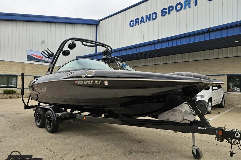 Slide: The Image of 2018 Supreme S226 boat on trailer at Grand Sport Center dealership. - 15