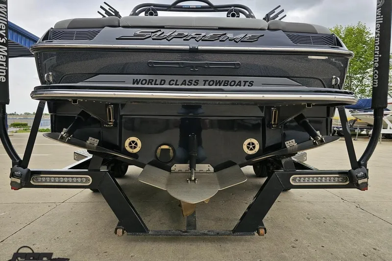 Slide: The Image of 2018 Supreme S226 towboat rear view, showcasing "World Class Towboats" branding. - 34