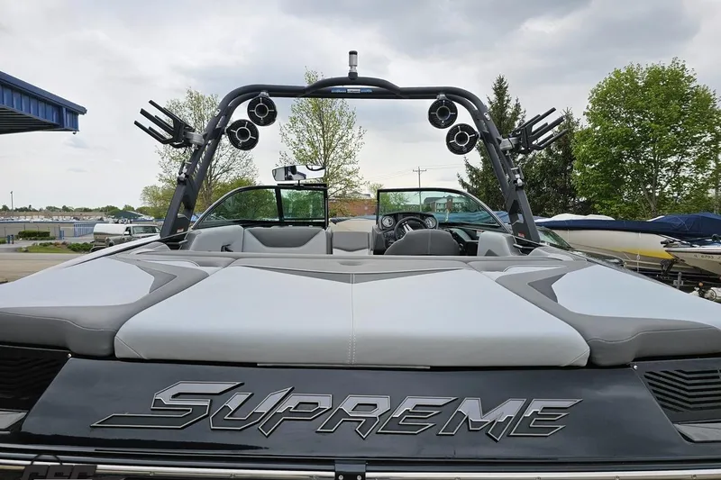 Slide: The Image of 2018 Supreme S226 boat with sleek design, tower speakers, and spacious seating. - 36