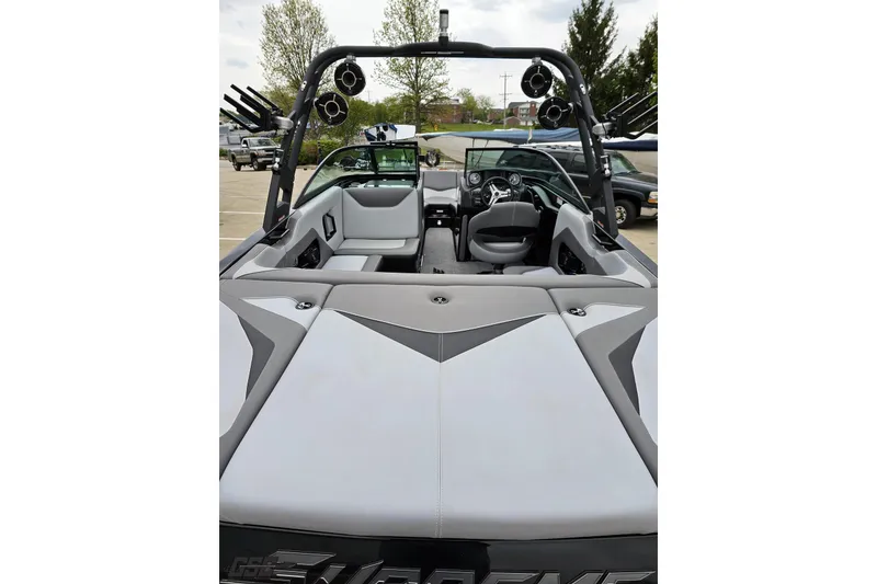 Slide: The Image of 2018 Supreme S226 boat interior with sleek seating and advanced dashboard features. - 40
