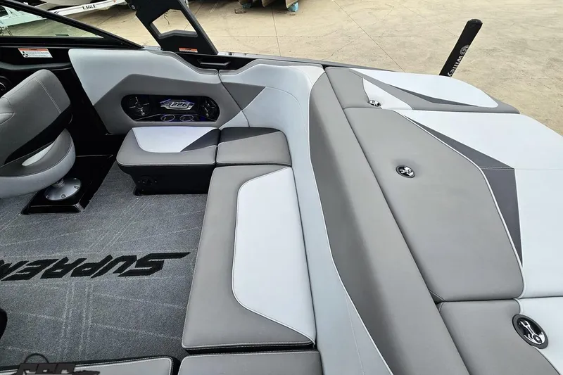 Slide: The Image of Interior of a 2018 Supreme S226 boat with gray and white seating. - 44