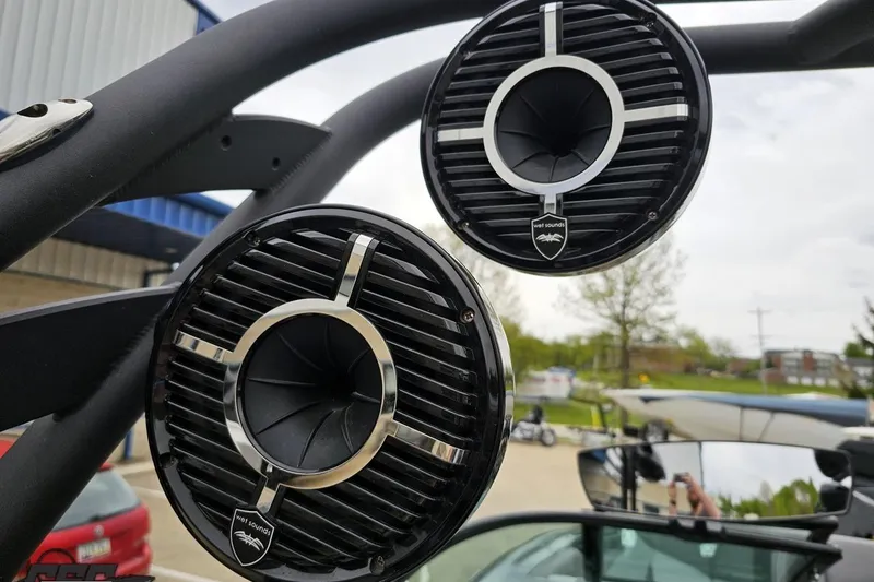 Slide: The Image of Outdoor speakers on a 2018 Supreme S226 boat, featuring sleek black design and chrome accents. - 48