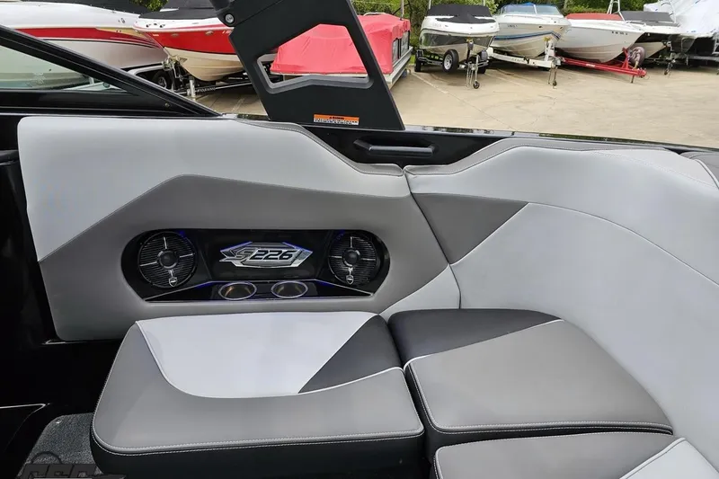 Slide: The Image of Interior of a 2018 Supreme S226 boat with stylish seating and speaker system. - 49