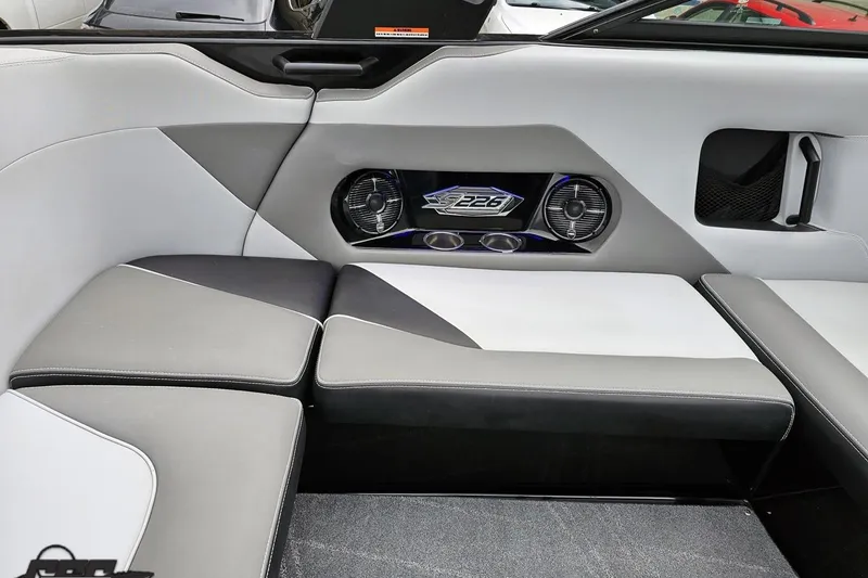 Slide: The Image of Interior of a 2018 Supreme S226 boat with stylish seating and speaker system. - 52