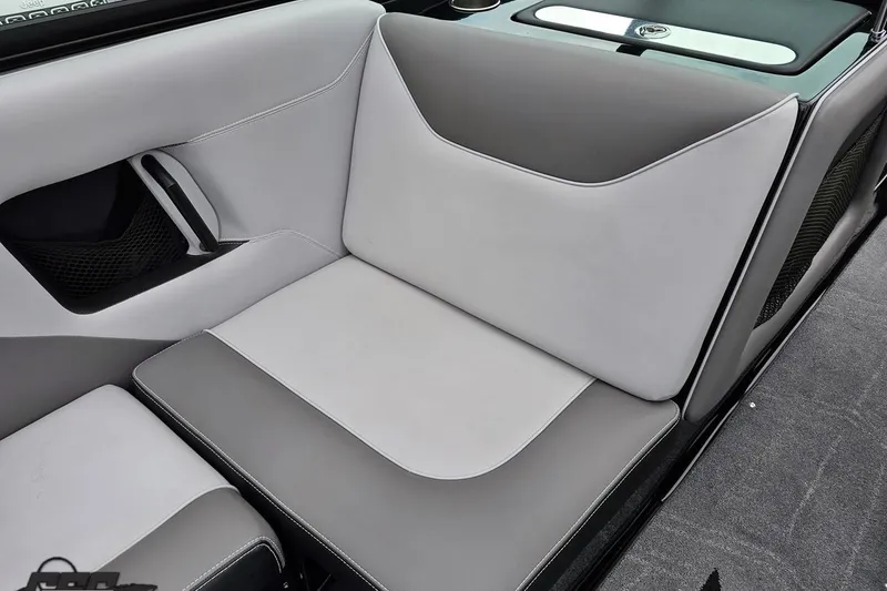 Slide: The Image of Luxurious interior seating of 2018 Supreme S226 boat, featuring sleek gray upholstery. - 56