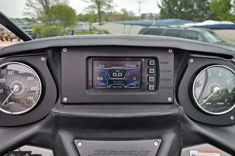 Slide: The Image of Dashboard of a 2018 Supreme S226 boat with speedometer and digital display. - 66